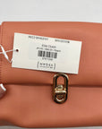 Jules Kae Peach Ellie Turn Lock Clutch