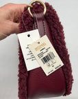 Michael Kors Oxblood Pebbled Leather Carmela Pouchette Crossbody Bag