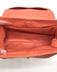 Jules Kae Peach Ellie Turn Lock Clutch
