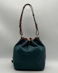 Dooney & Bourke Teal Pebbled Grain Leather Kendall Drawstring Bag