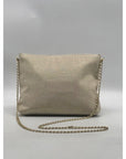 Leslie Dasch Dress For Cocktails Beige and Gold Speckled Tweed Handbag Blue Bow