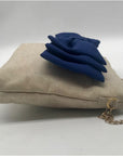 Leslie Dasch Dress For Cocktails Beige and Gold Speckled Tweed Handbag Blue Bow