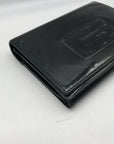 Gucci Black Patent Leather Tri-Fold Embossed Wallet