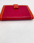 Coach Signature Embossed Leather Pink & Orange Bifold Wallet