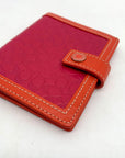 Coach Signature Embossed Leather Pink & Orange Bifold Wallet