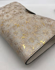 Michael Kors Gold Floral Embossed Leather Karla Wristlet
