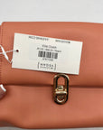 Jules Kae Peach Ellie Turn Lock Clutch