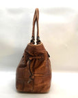 Dooney & Bourke Brown Tortoise Embossed Chiara Drawstring Satchel