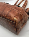 Dooney & Bourke Brown Tortoise Embossed Chiara Drawstring Satchel