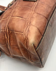 Dooney & Bourke Brown Tortoise Embossed Chiara Drawstring Satchel