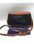 Vintage Dooney & Bourke Black and Tan All Weather Leather Crossbody Bag
