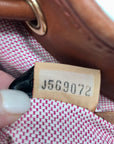 Dooney & Bourke Ivory & Brown Vintage Drawstring Shoulder Bag