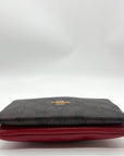 Coach Red And Brown Coated Canvas Double Zip Wristlet