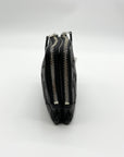 Black leather pouch with zipper on a white background