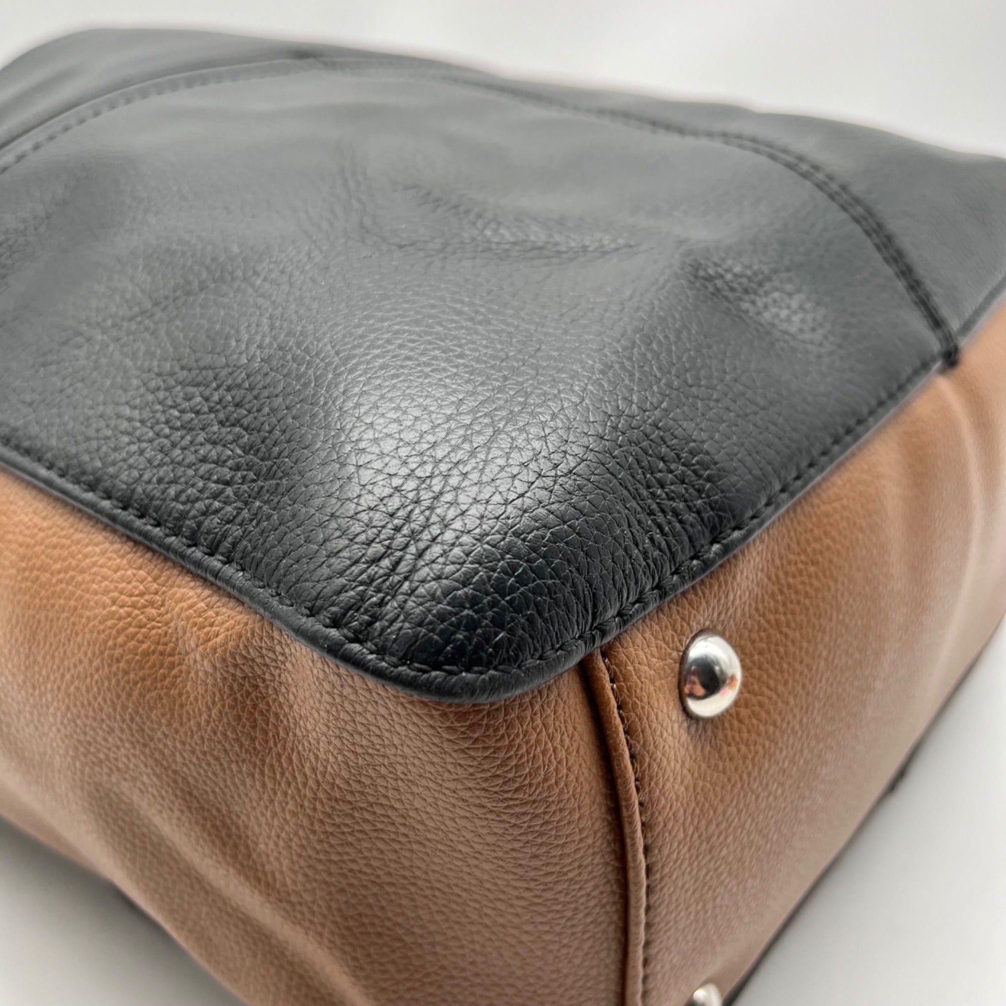 Tignanello Black And Brown Pebbled Leather Tote Bag