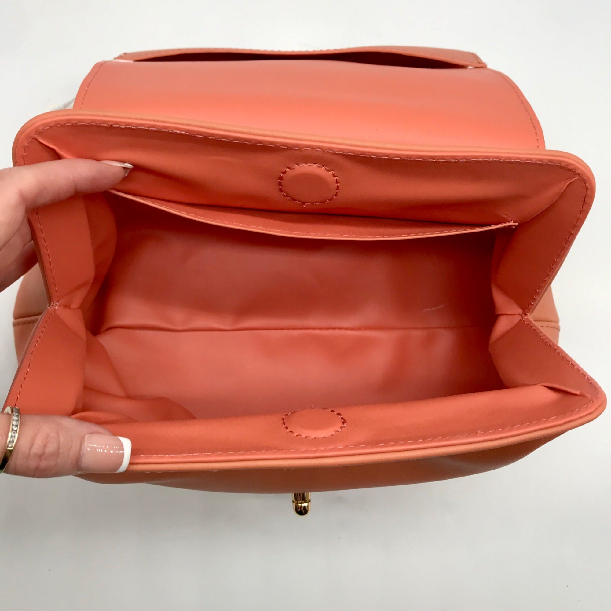 Jules Kae Peach Ellie Turn Lock Clutch