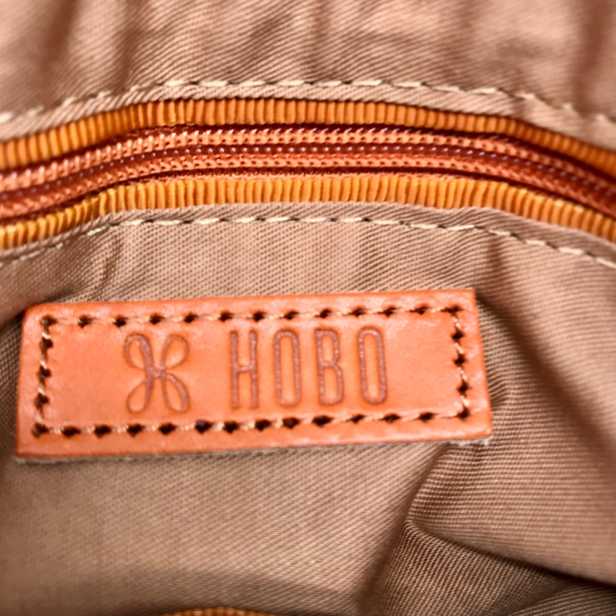 Hobo Taupe Pebbled Leather Harley Crossbody Sling