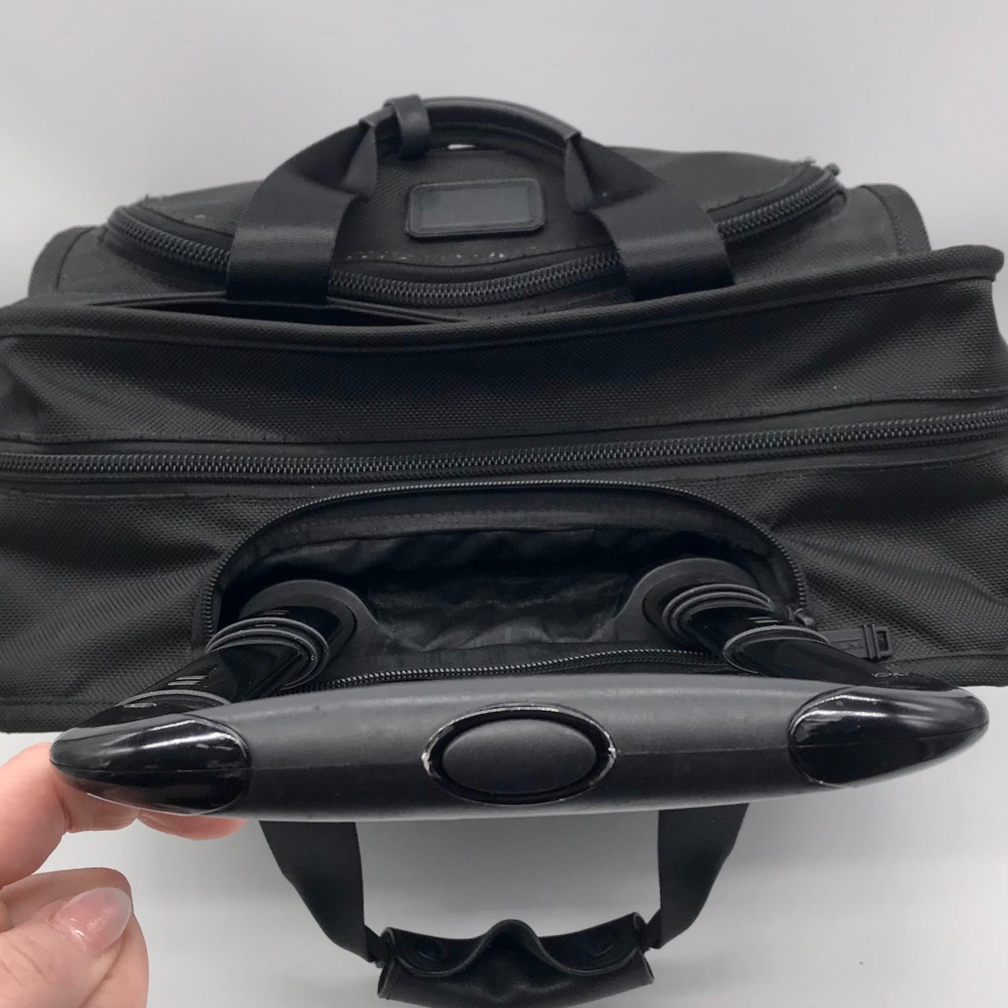 Tumi Black Ballistic Nylon 2-Wheeled Multi-Use Briefcase