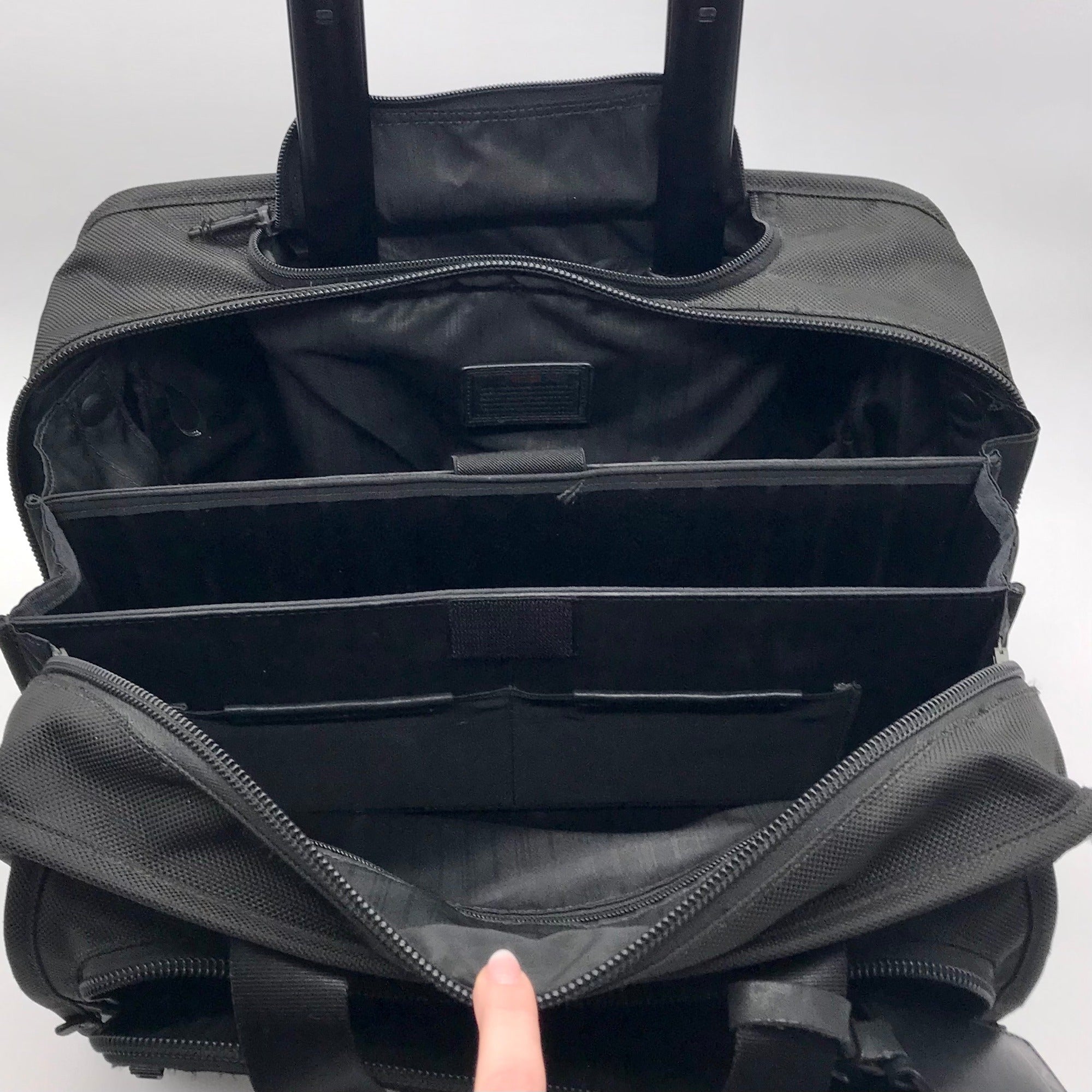 Tumi Black Ballistic Nylon 2-Wheeled Multi-Use Briefcase