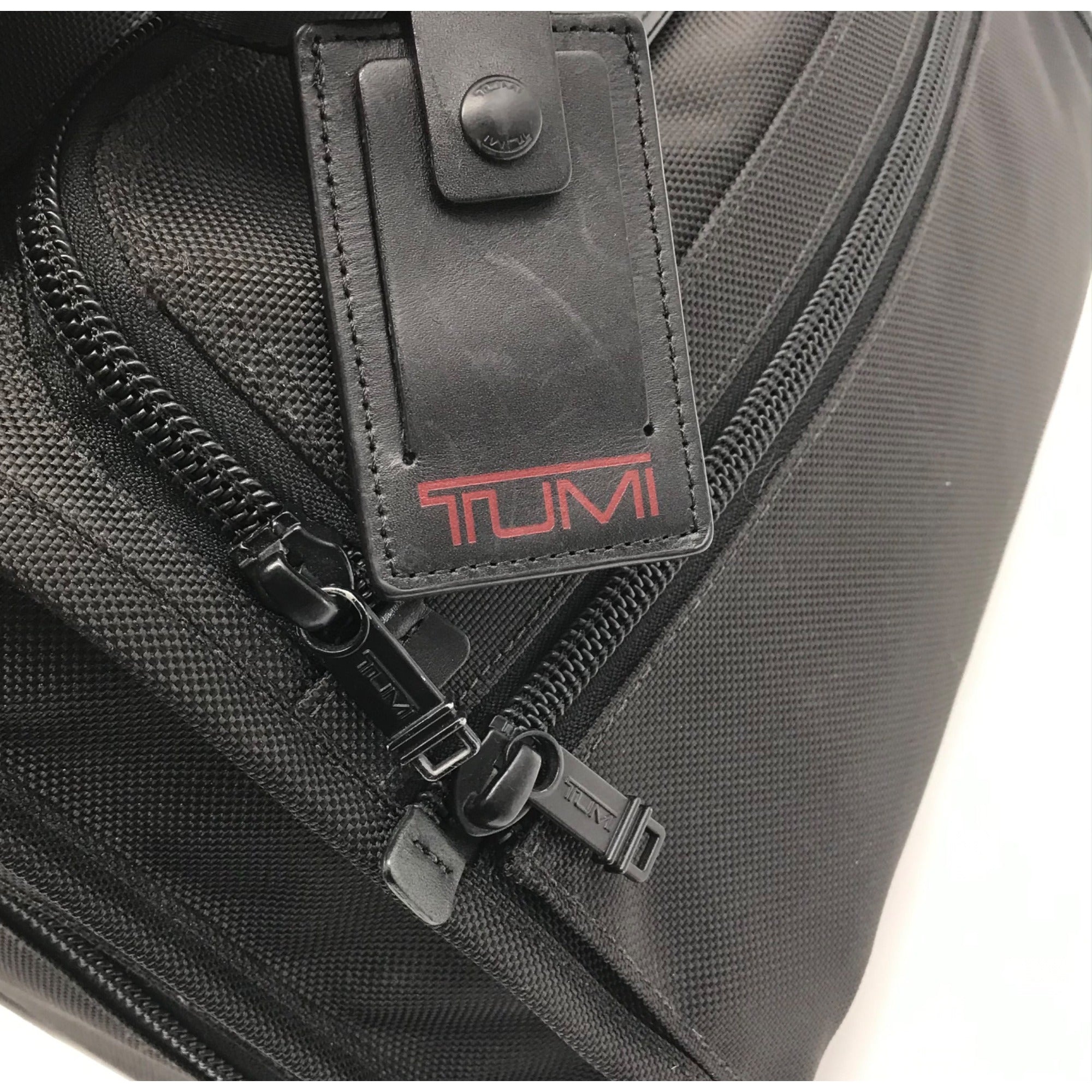 Tumi Black Ballistic Nylon 2-Wheeled Multi-Use Briefcase