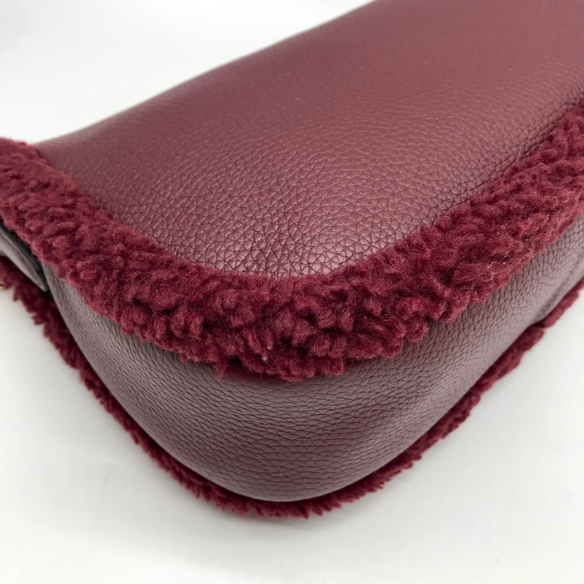 Michael Kors Oxblood Pebbled Leather Carmela Pouchette Crossbody Bag