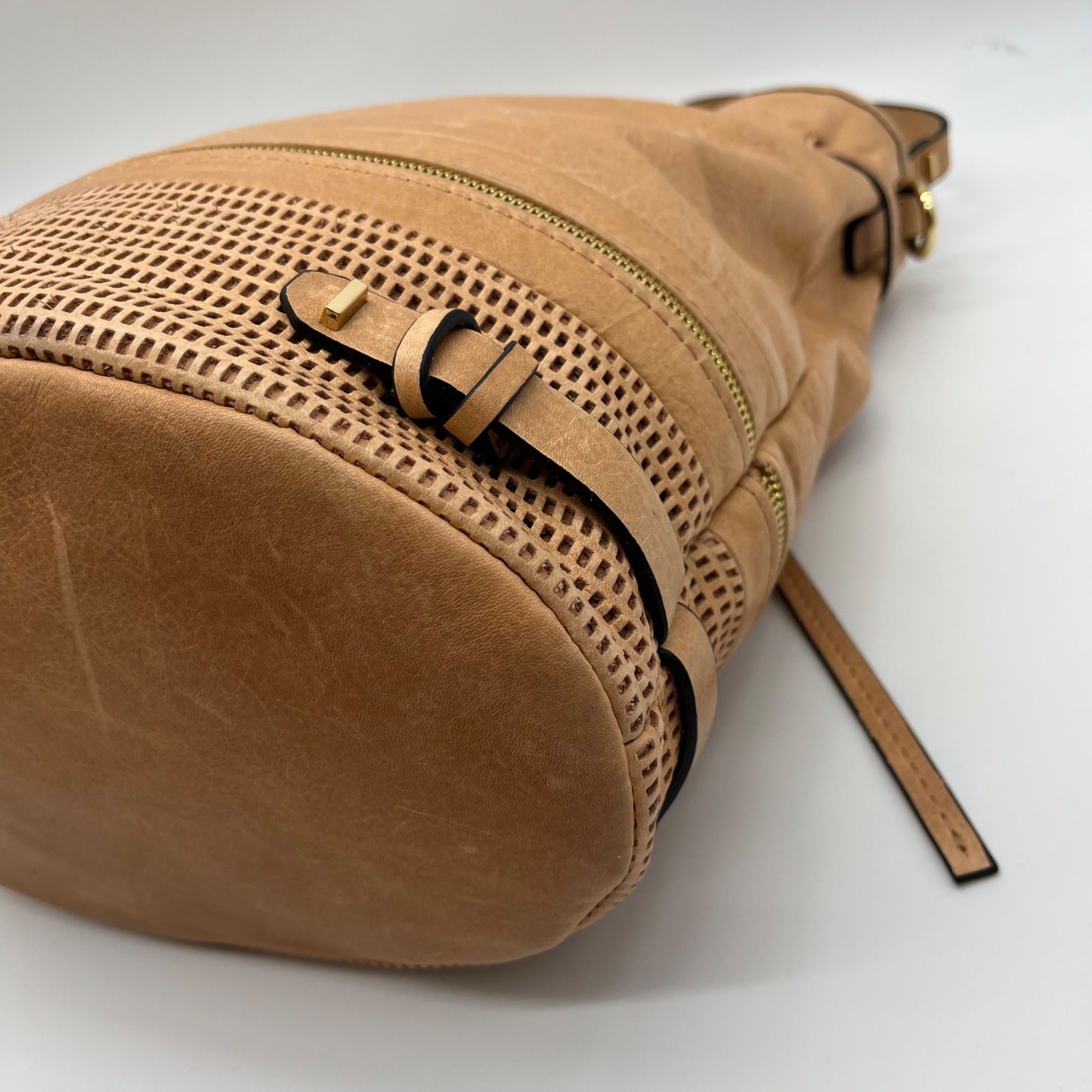 She + Lo Tan Perforated Drawstring Hobo Bag