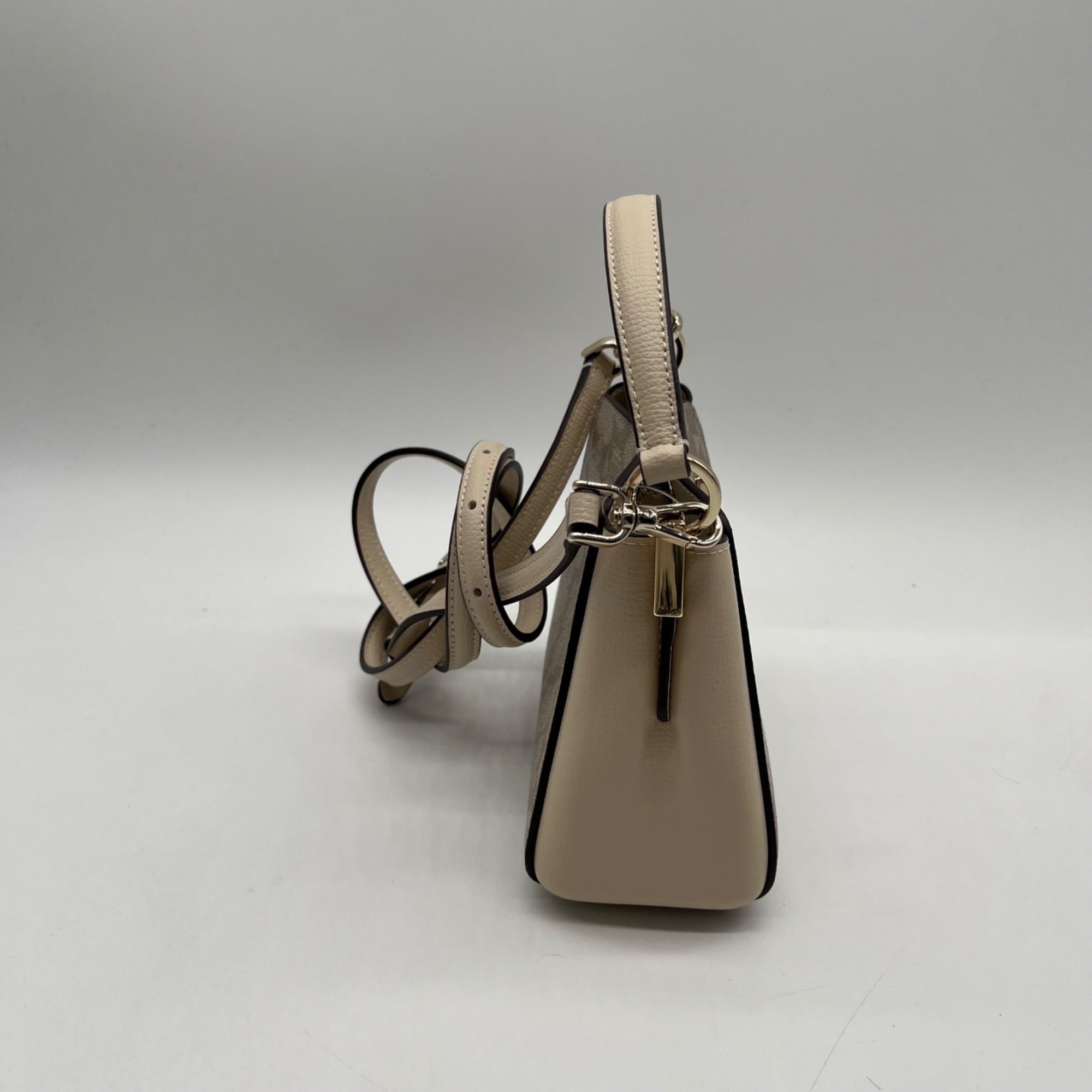 Kate Spade Dark Beige Spade Flower PVC Mini Top Handle Crossbody