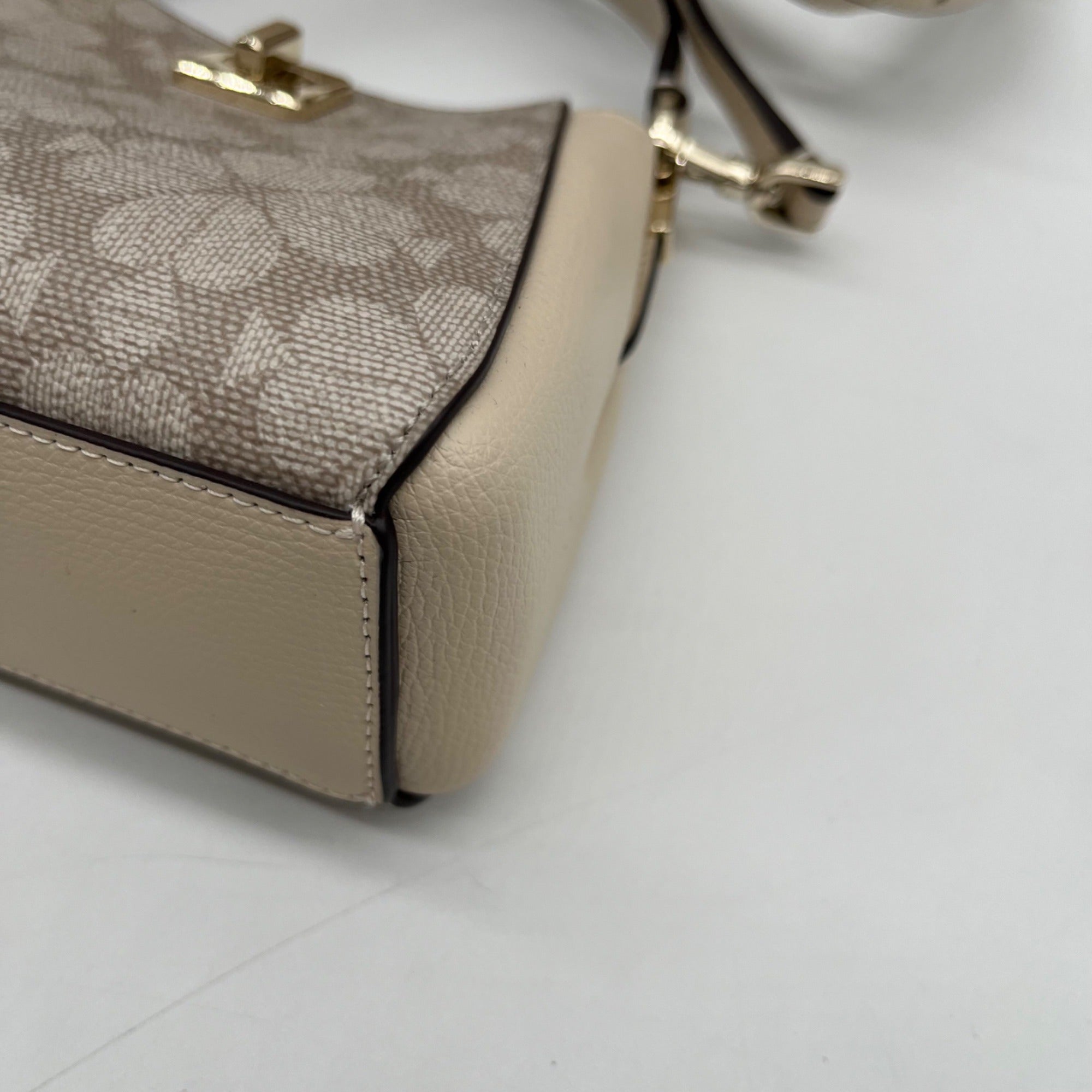 Kate Spade Dark Beige Spade Flower PVC Mini Top Handle Crossbody