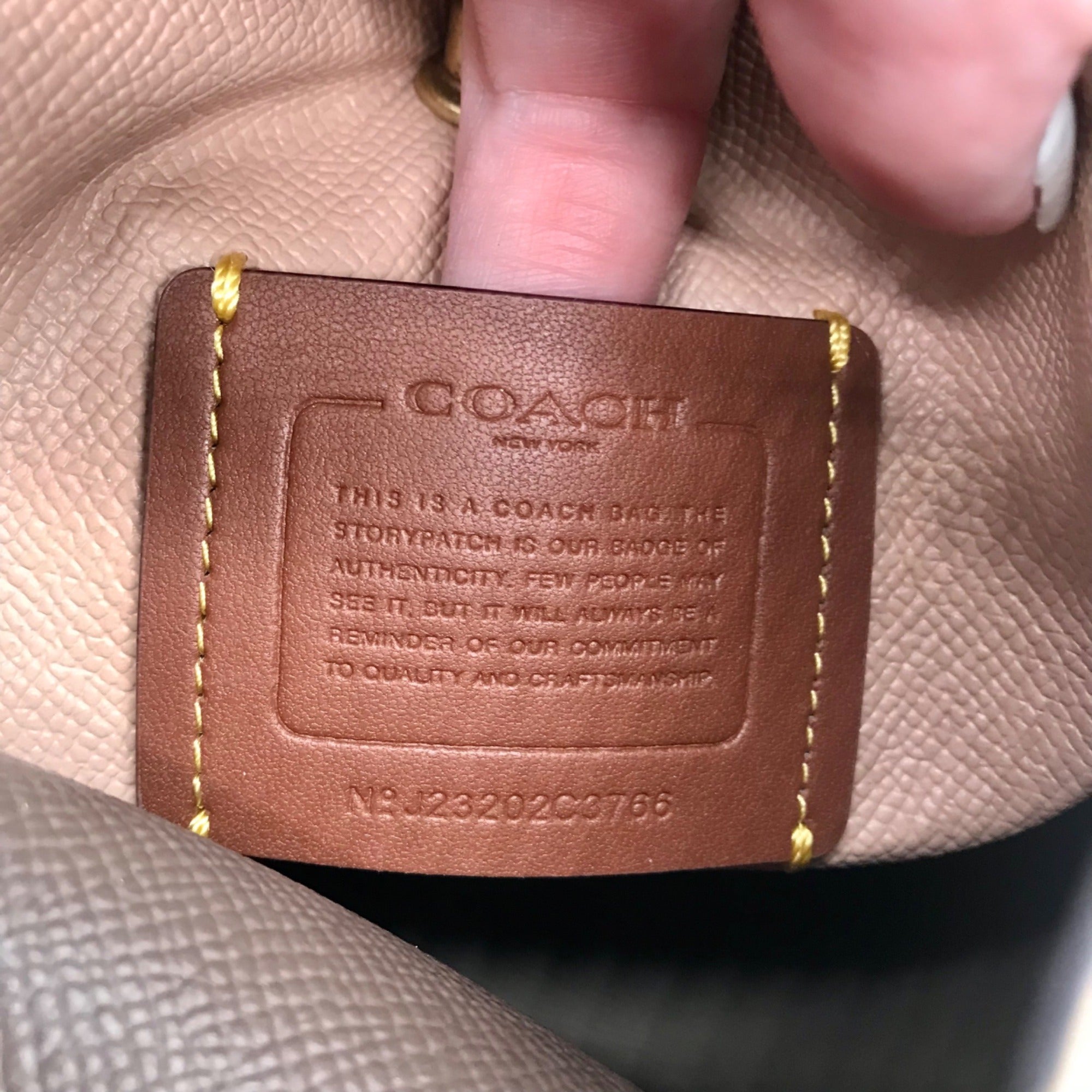 Coach Tan Pebbled Leather Charlie Bucket Bag