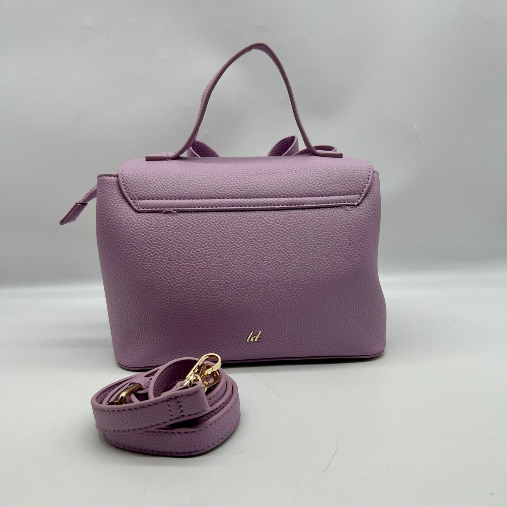 Like Dreams Purple Leather Bowtie Crossbody Bag
