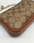 Coach Brown Signature C Monogram Mini Wristlet