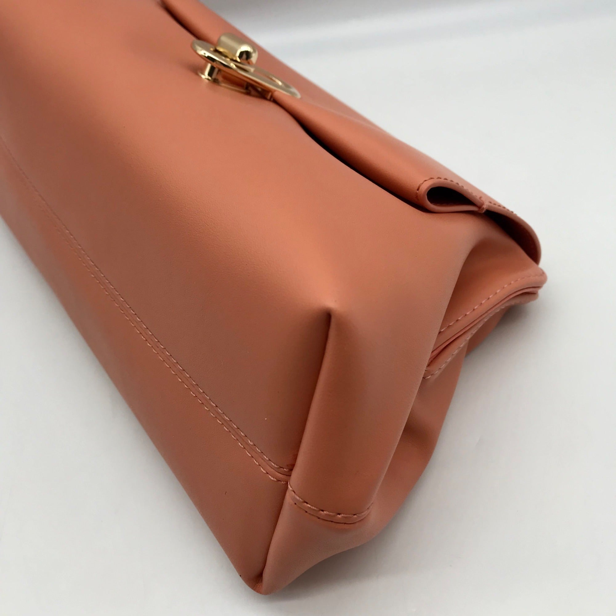 Jules Kae Peach Ellie Turn Lock Clutch