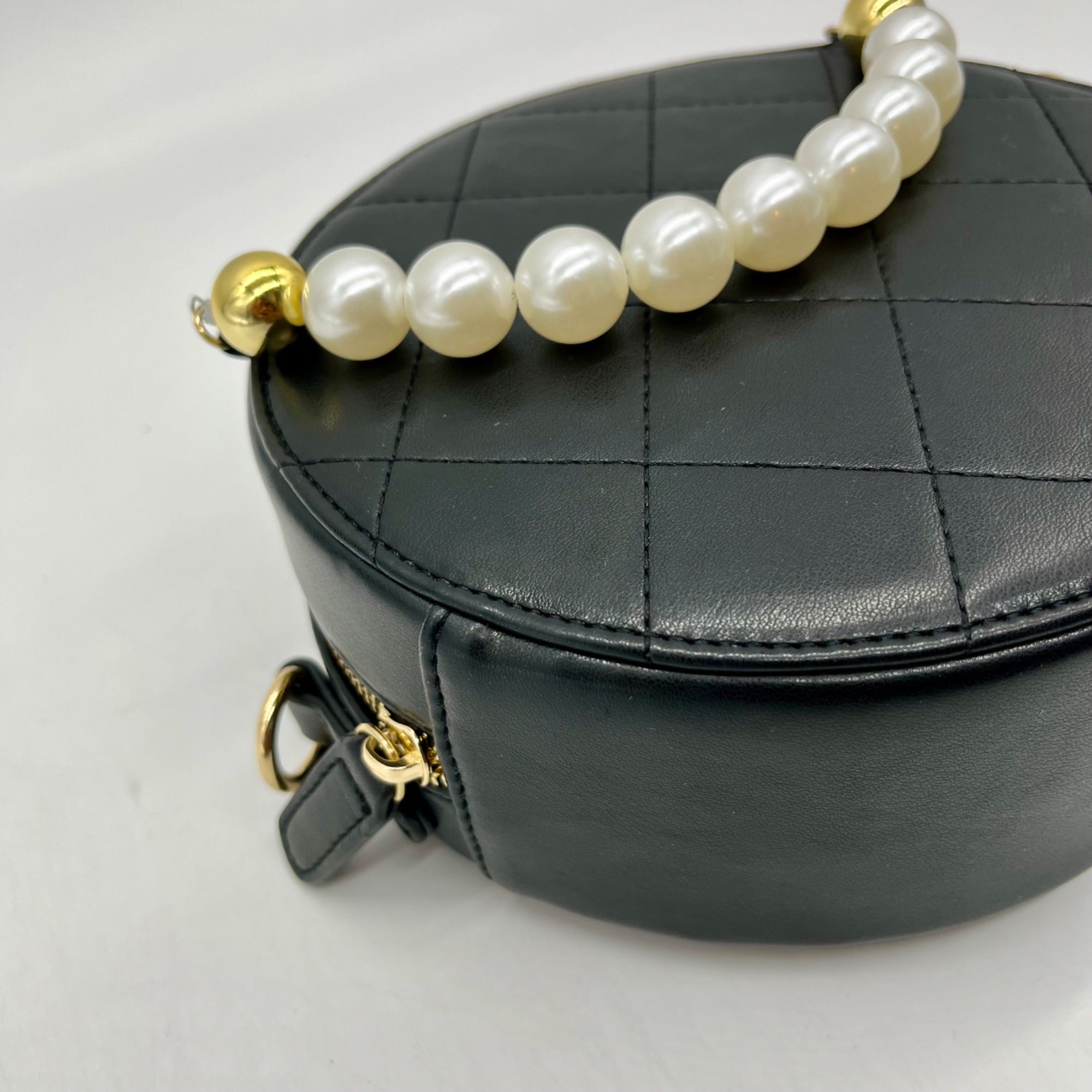MMS Brands Black Quilted Leather Round Clutch With Chain