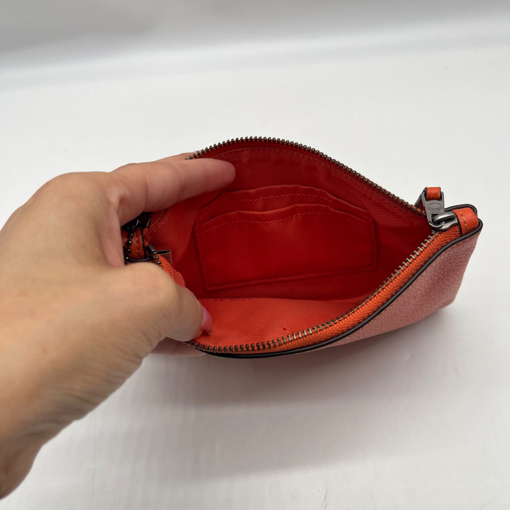 Coach Orange Leather Polished Pebble Small Wristlet