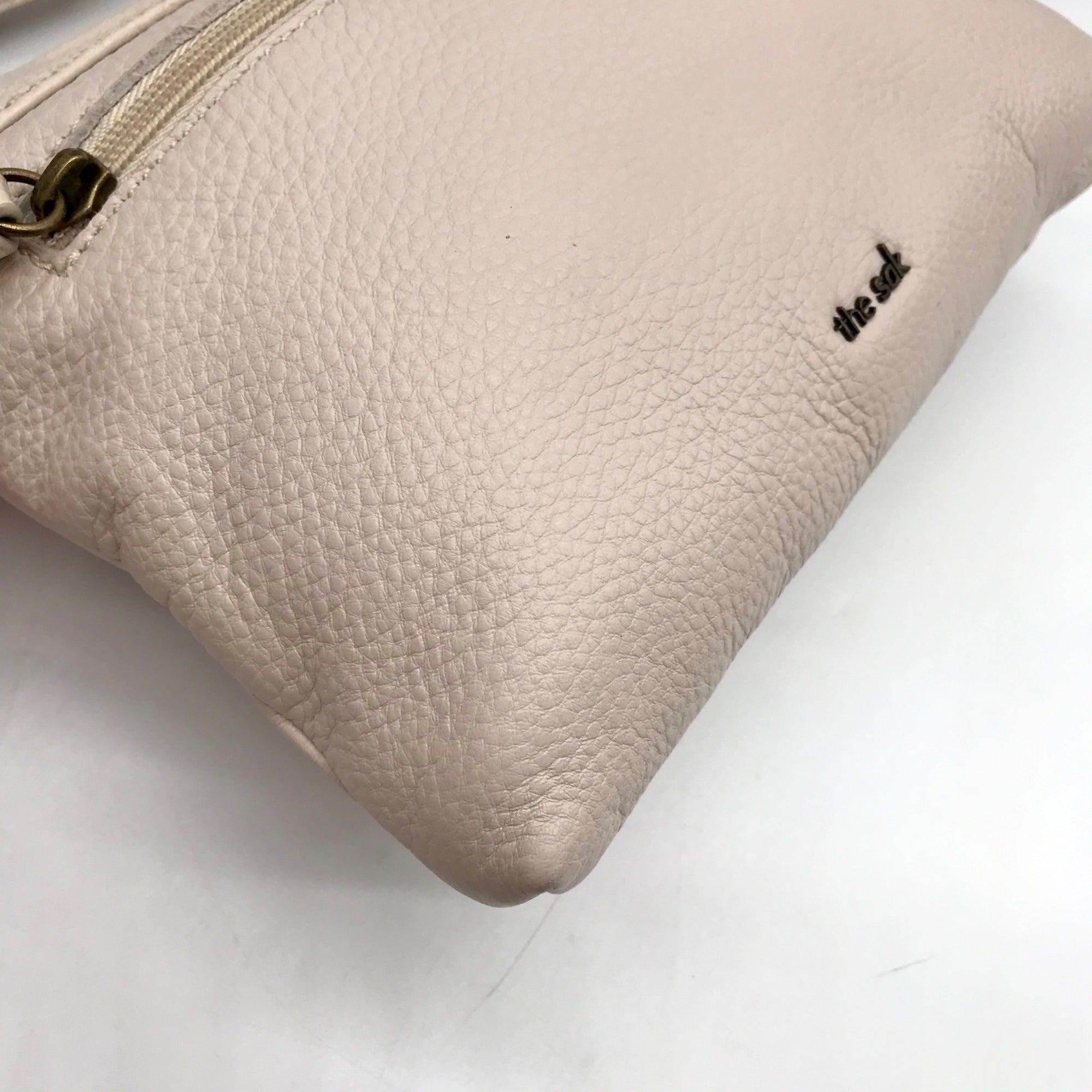 The Sak Off-White Pebbled Leather Sanibel Crossbody Bag