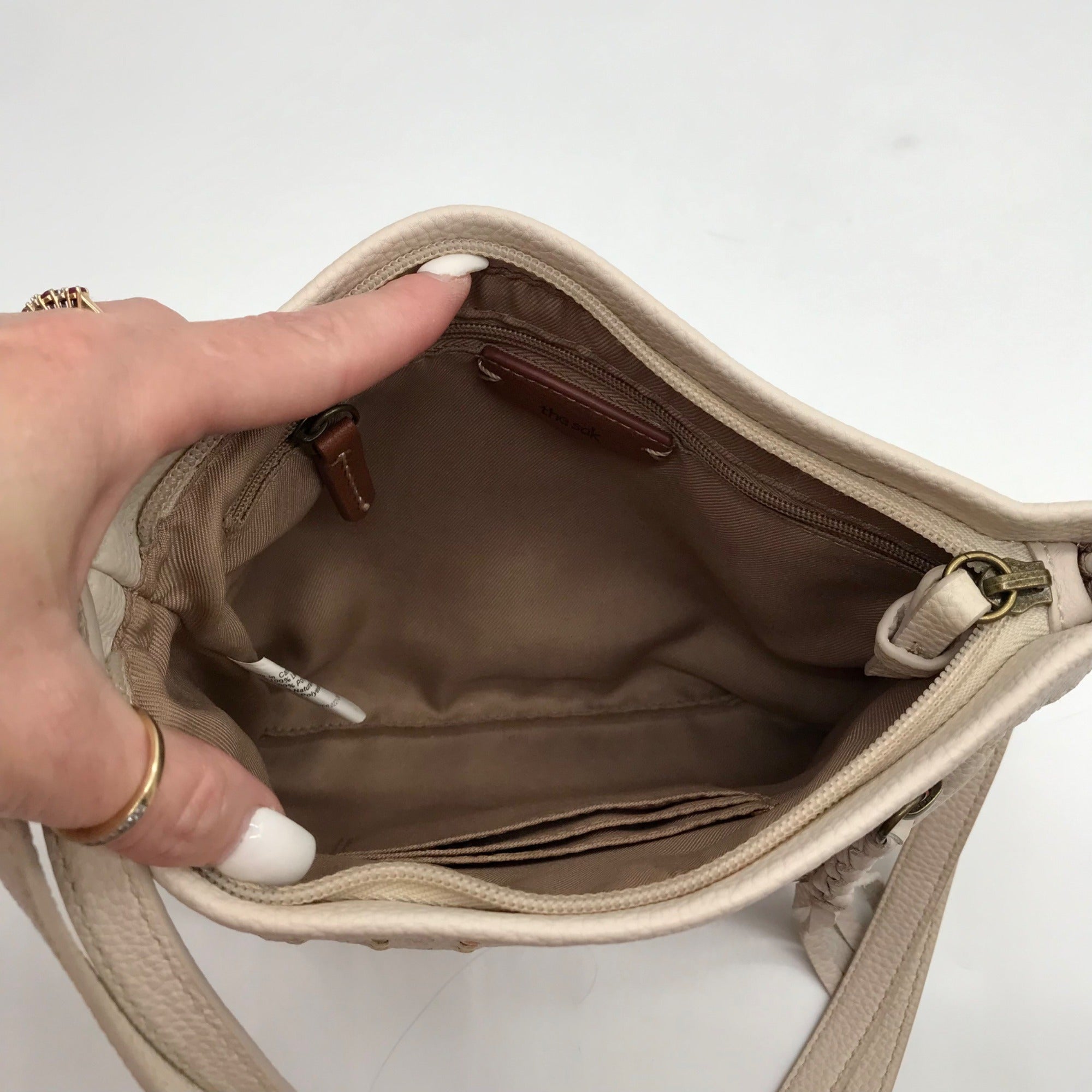 The Sak Off-White Pebbled Leather Sanibel Crossbody Bag