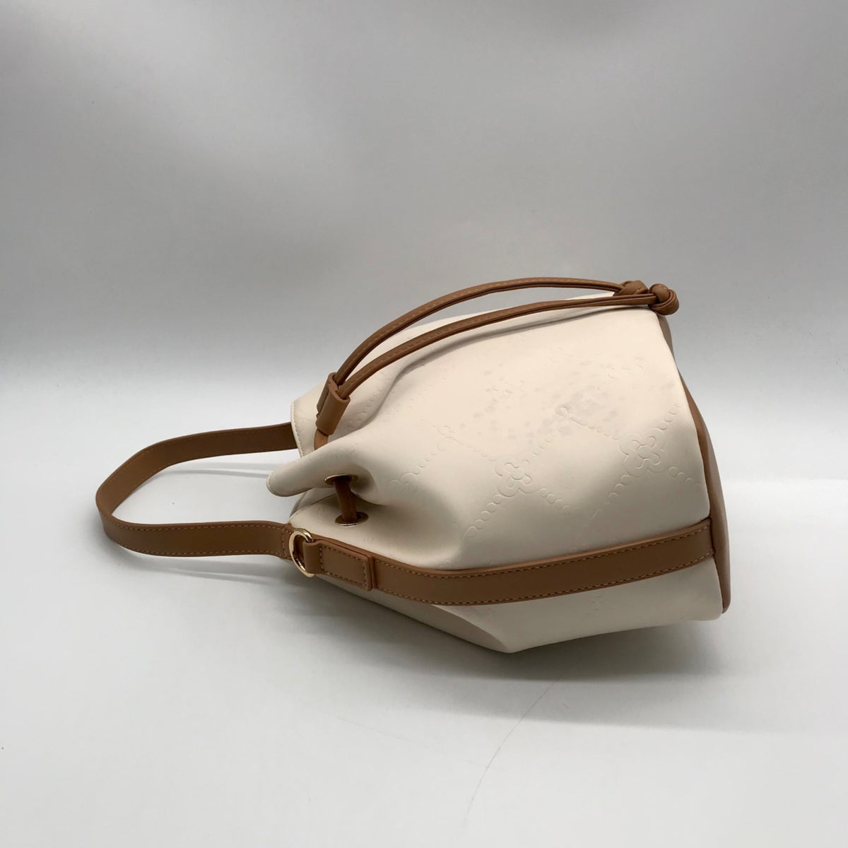 Like Dreams Off White Debossed Faux Leather Bucket Bag