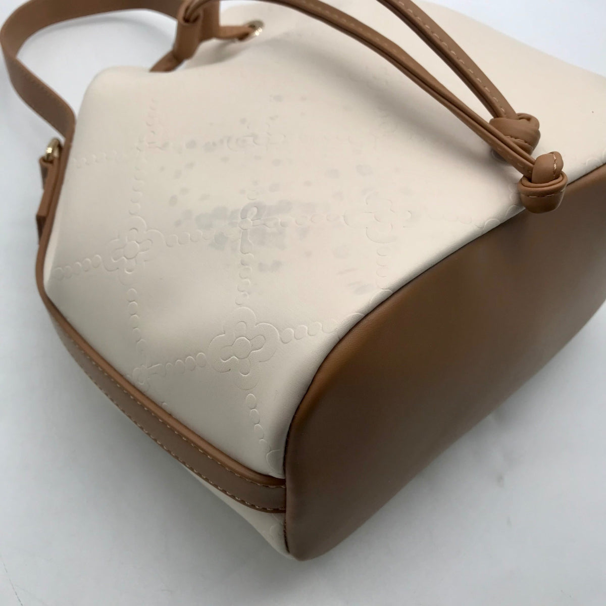 Like Dreams Off White Debossed Faux Leather Bucket Bag