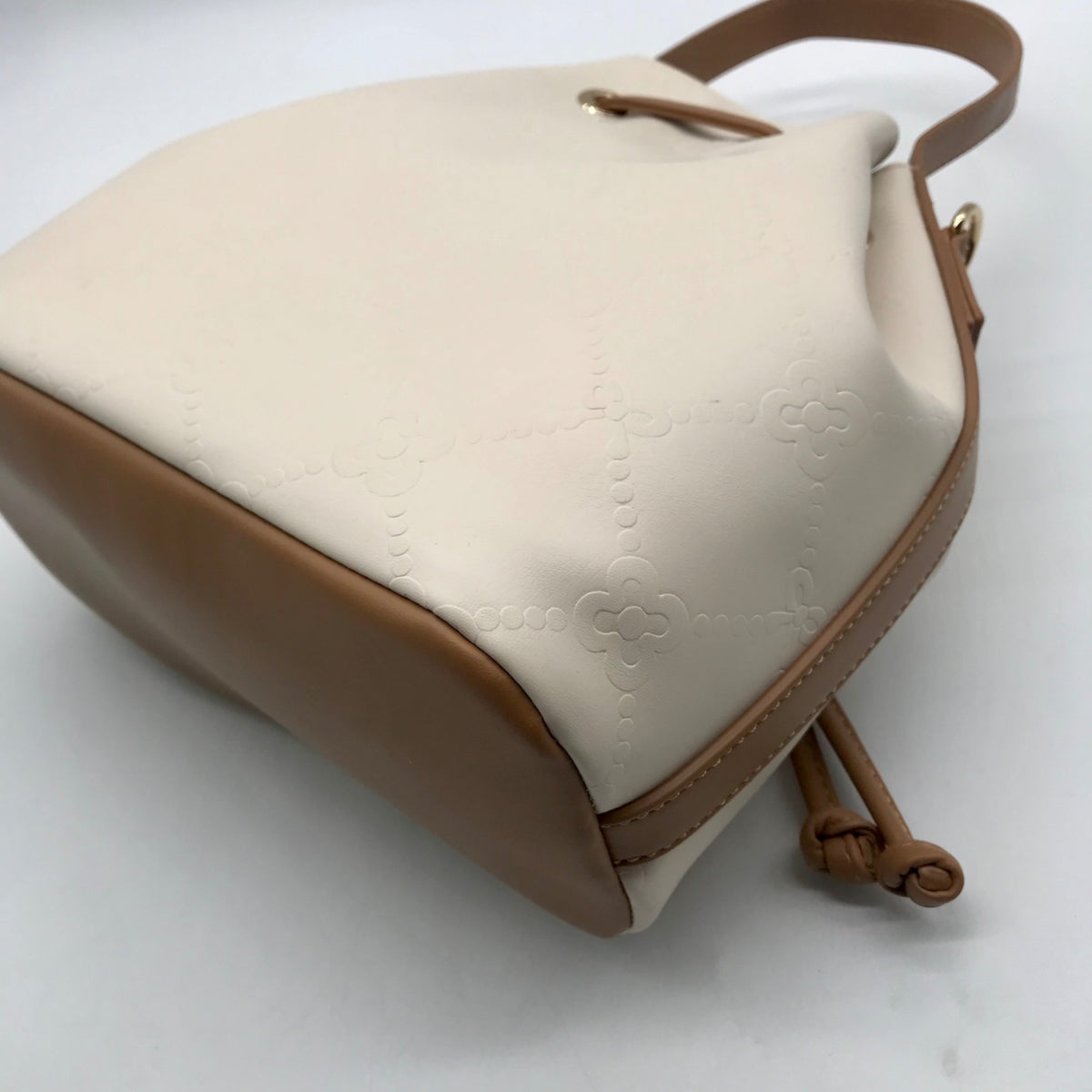Like Dreams Off White Debossed Faux Leather Bucket Bag