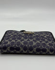 Coach Purple Signature Coated Canvas Wristlet
