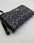 Coach Purple Signature Coated Canvas Wristlet