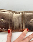 Kate Spade Cameron Street Metallic Rose Gold Bi-Fold Wallet