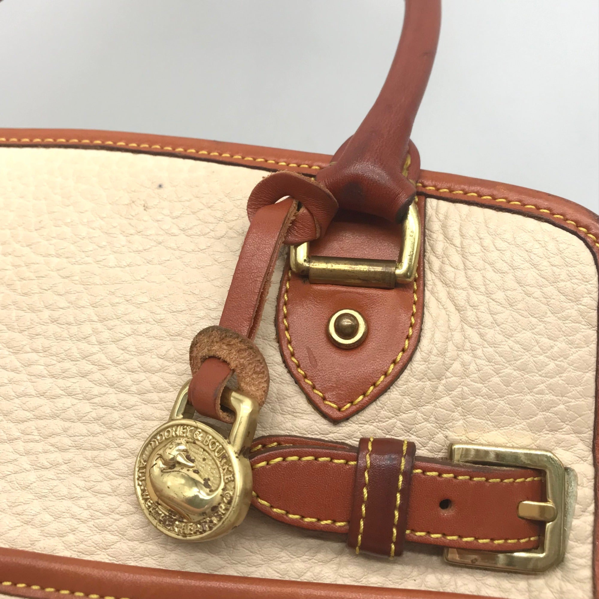 Dooney &amp; Bourke AWL Bone &amp; British Tan Pebbled Leather Buckle Crossbody Satchel