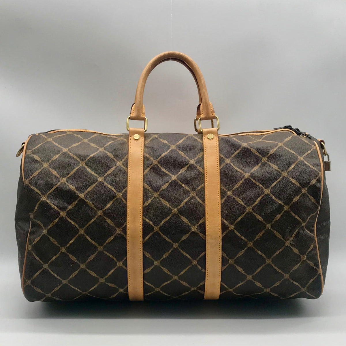 Hunting World Brown Geometric Print Coated Canvas Duffel Bag