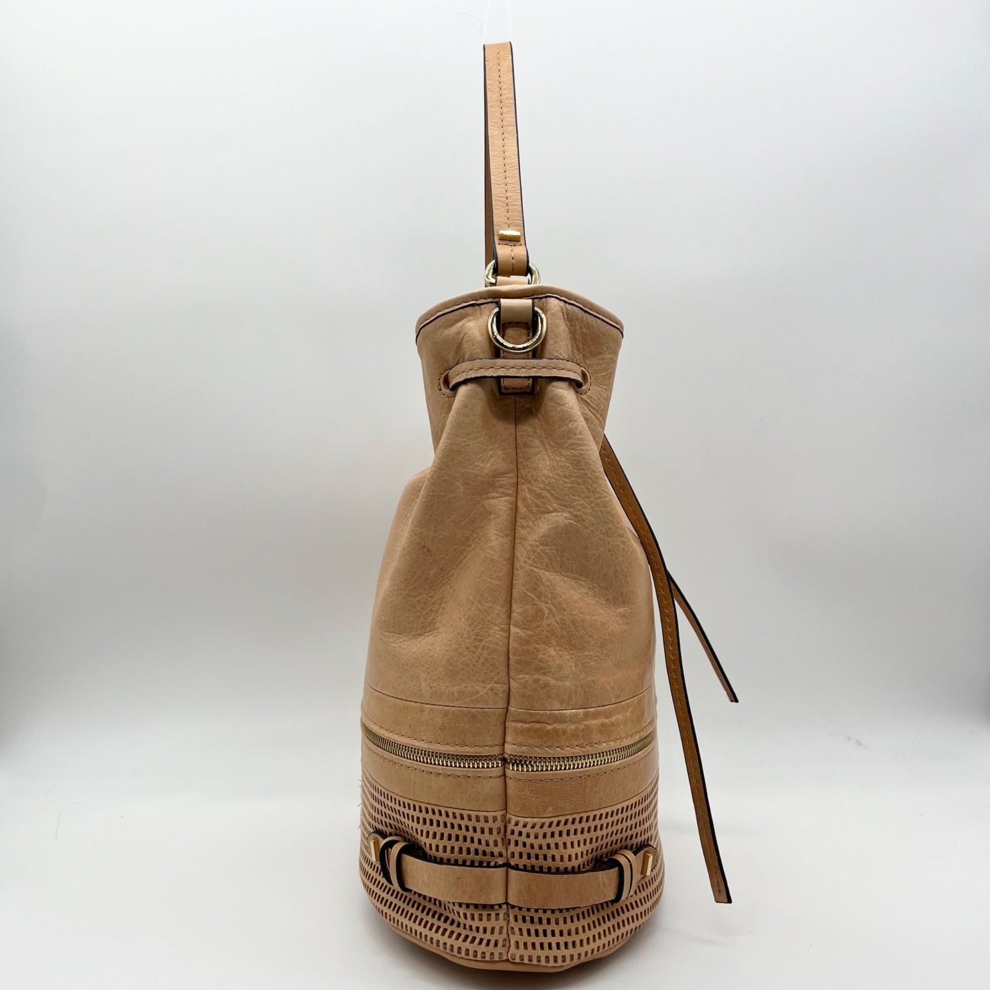 She + Lo Tan Perforated Drawstring Hobo Bag