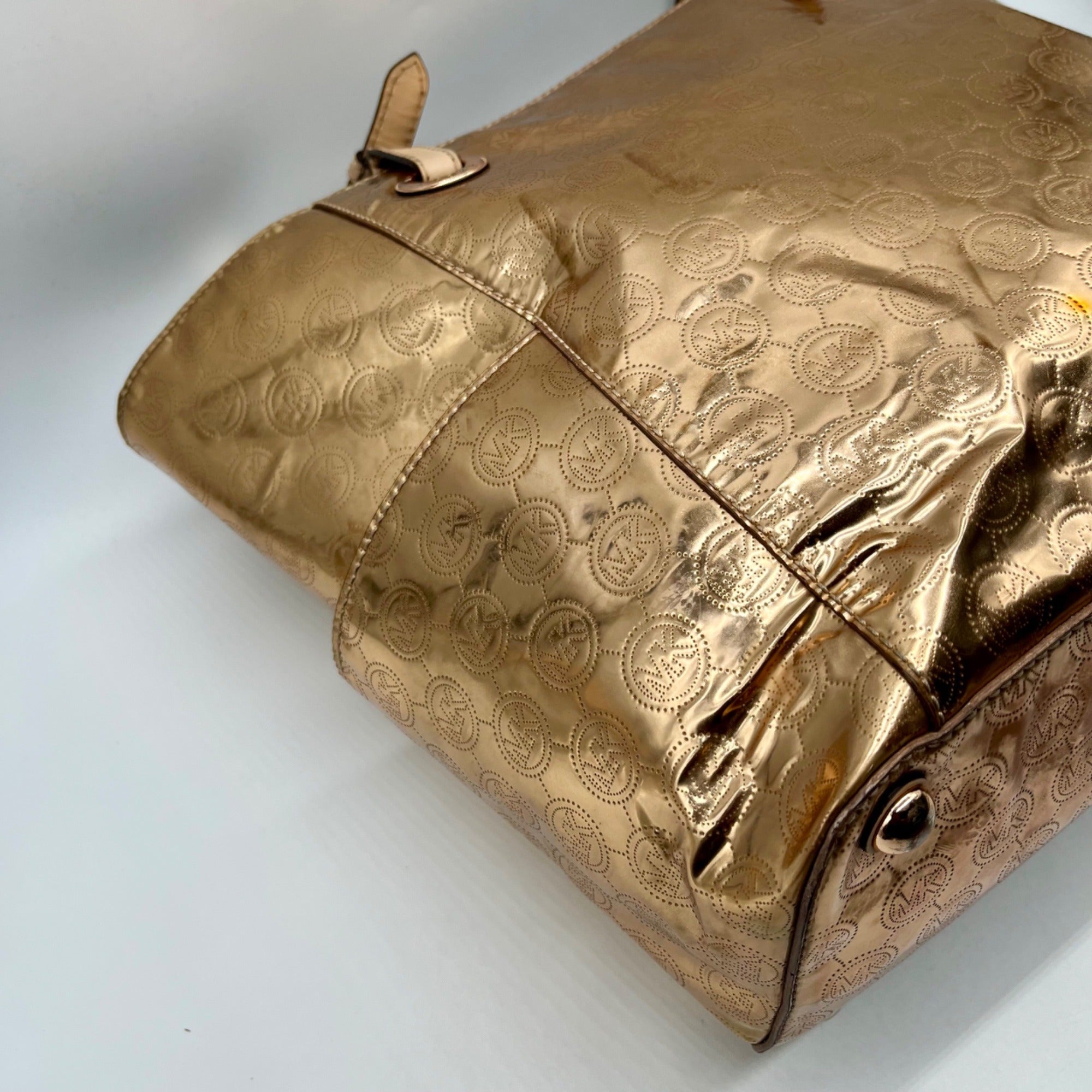 Michael Kors Metallic Rose Gold Embossed Signature Monogram Tote Bag