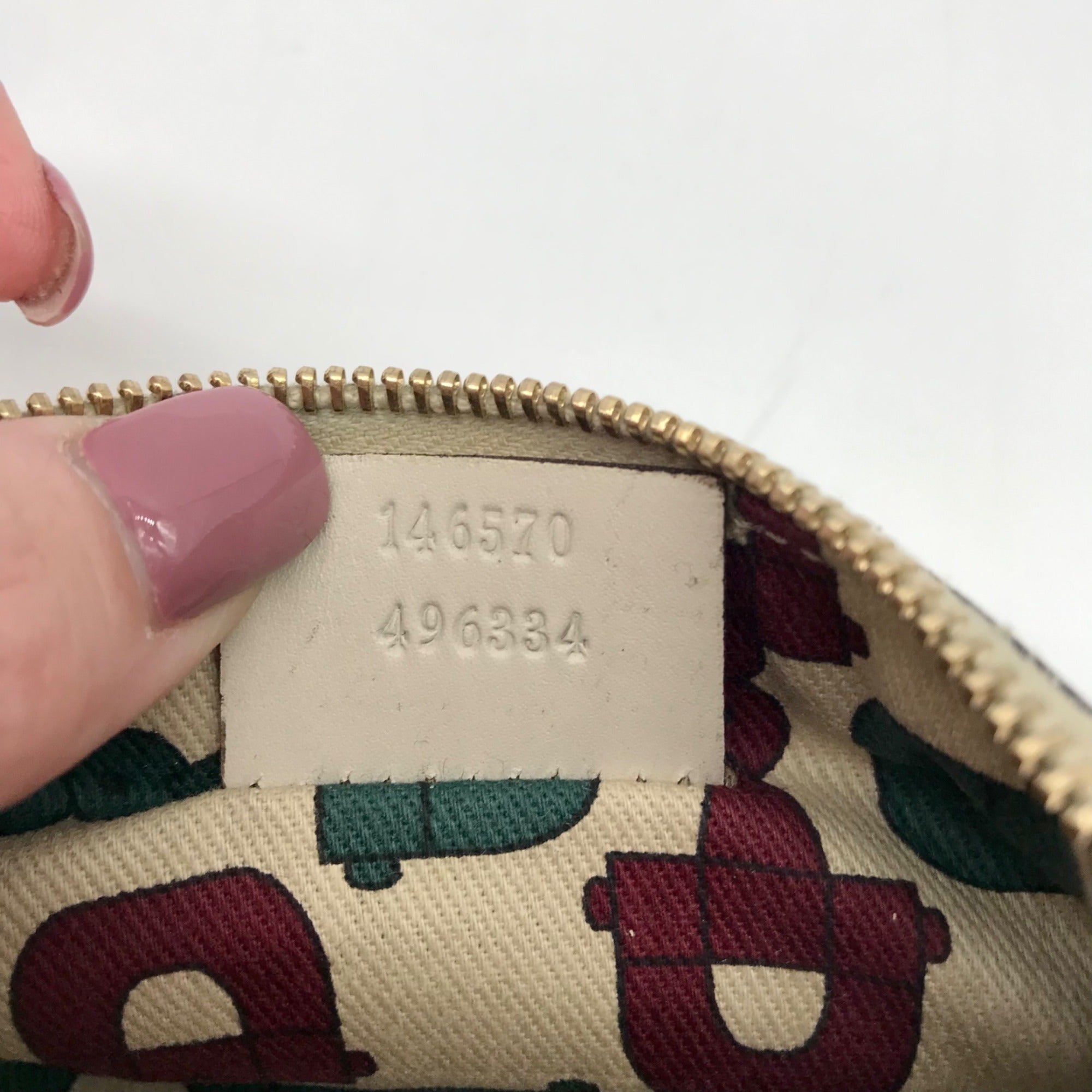 Gucci Off-White Monogram Leather Zip Wallet