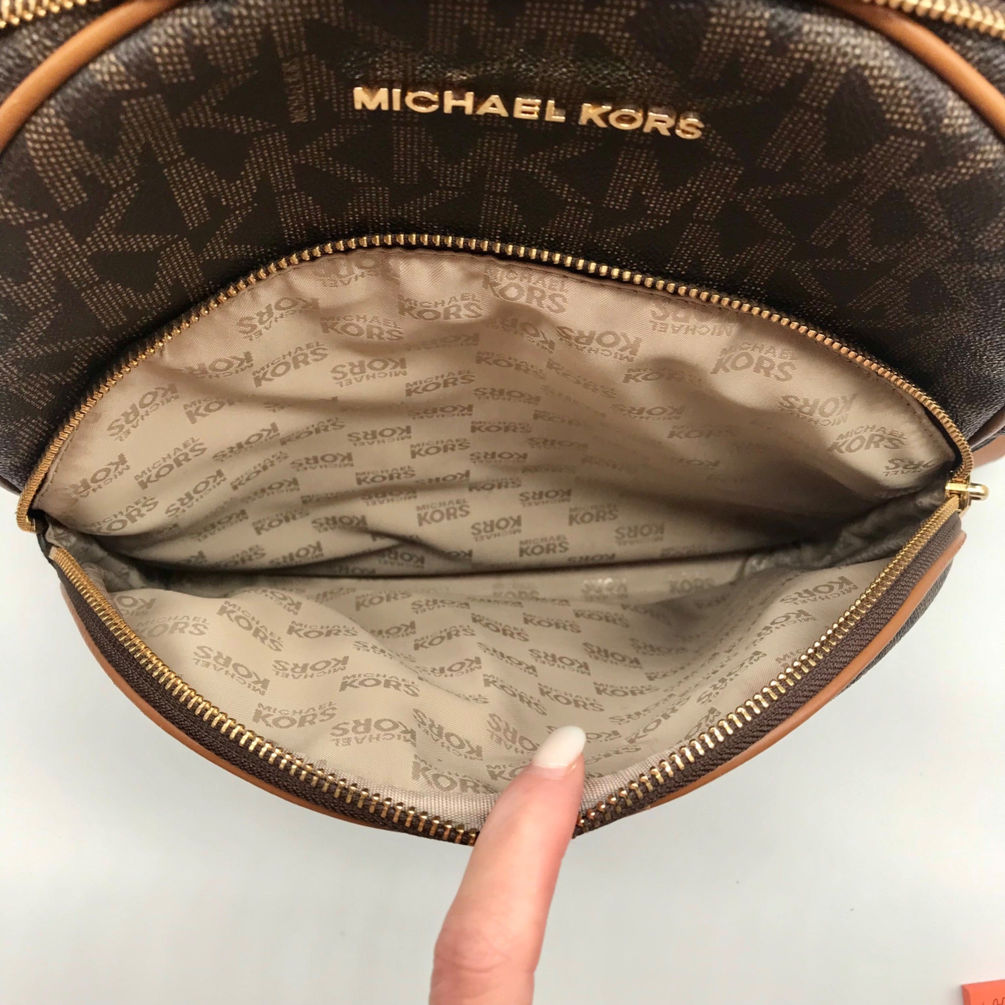 Michael Kors Brown Coated Canvas  Medium Abbey Backpack