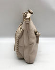 The Sak Off-White Pebbled Leather Sanibel Crossbody Bag