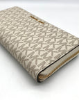 Michael Kors Vanilla Coated Canvas Monogram Jet Set Travel Continental Wallet